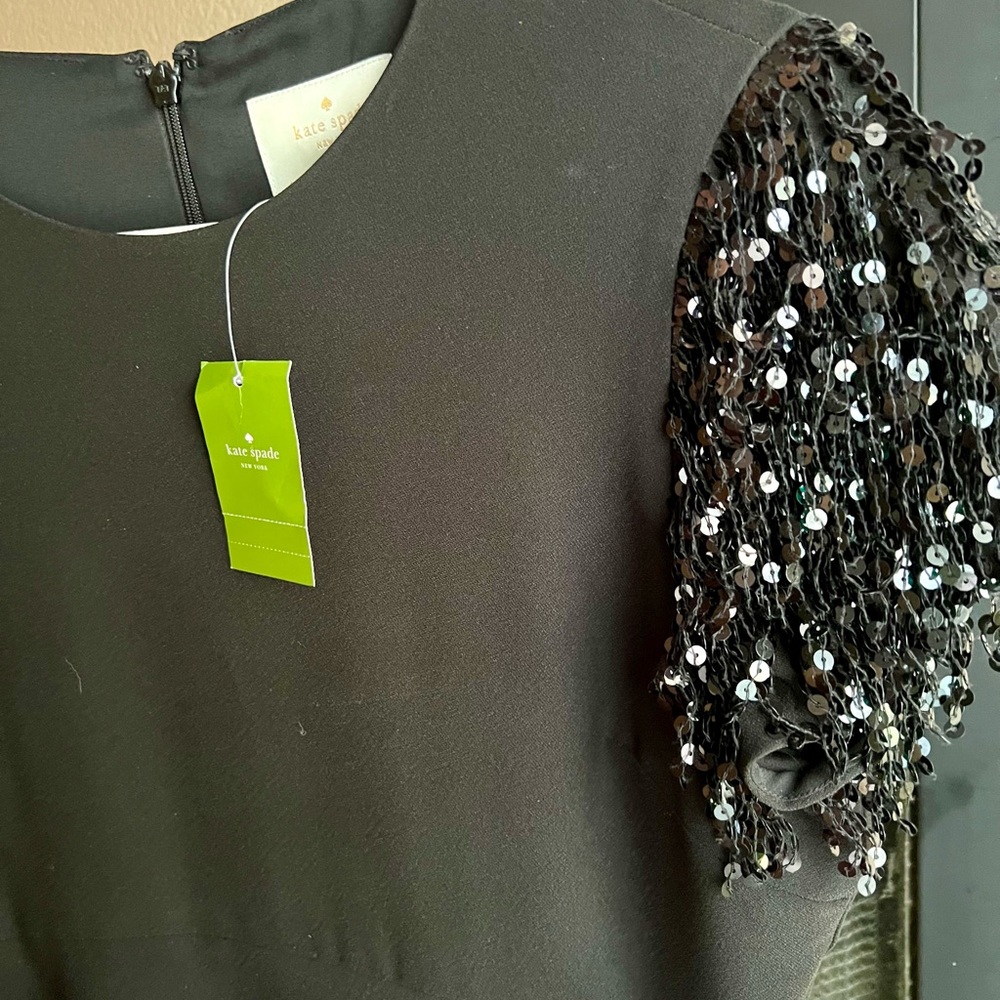The little black dress with glam Kate Spade